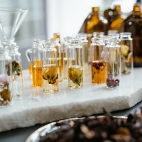 Photo by MART PRODUCTION: https://www.pexels.com/photo/clear-glass-bottles-on-white-surface-8450508/